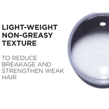 Load image into Gallery viewer, Kérastase Genesis Sérum Fortifiant showcasing its lightweight fast-absorbing serum texture designed for scalp application without residue.