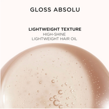 Load image into Gallery viewer, Kérastase Gloss Absolu Glaze Drops Hair Oil lightweight texture shown as a drop of oil, emphasizing a silky, weightless consistency designed for smooth, non-greasy finish.
