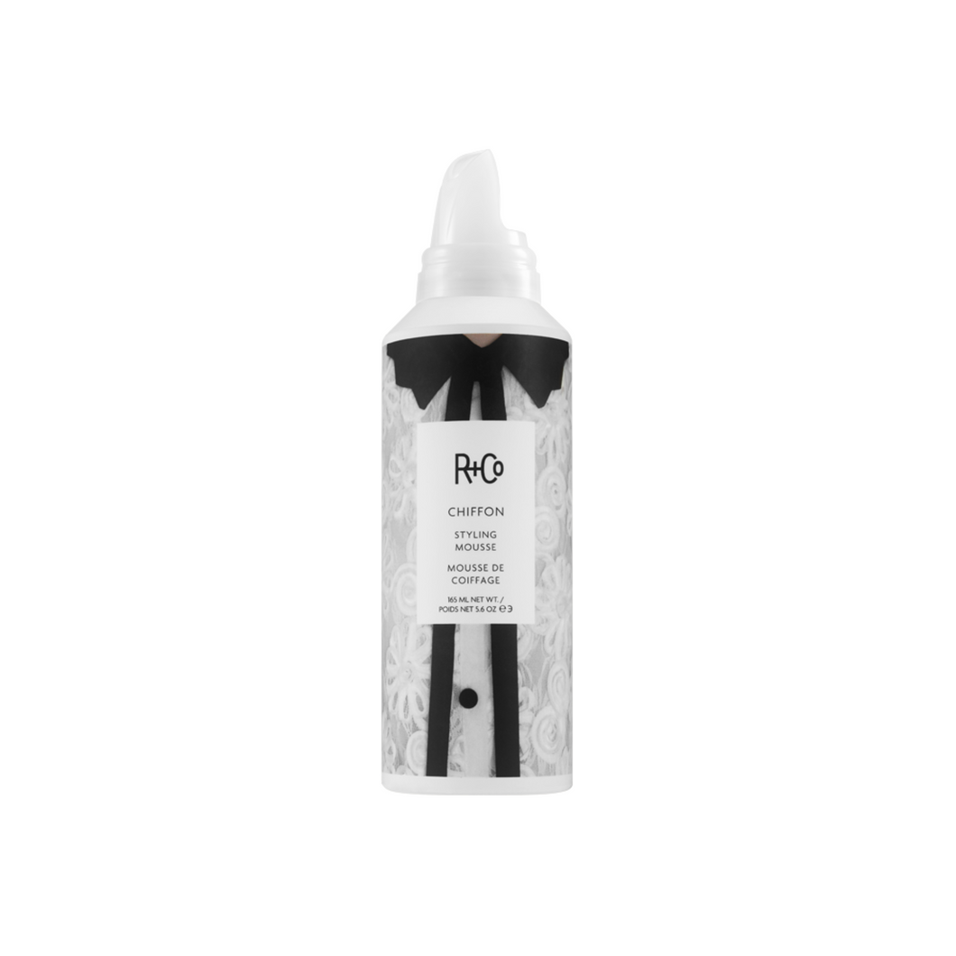 R+Co - CHIFFON Mousse bottle with white blouse and black trim/buttons/collar photo