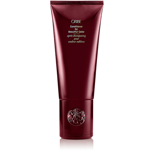 Oribe - Conditioner for Beautiful Color red bottle with flip top cap on bottom