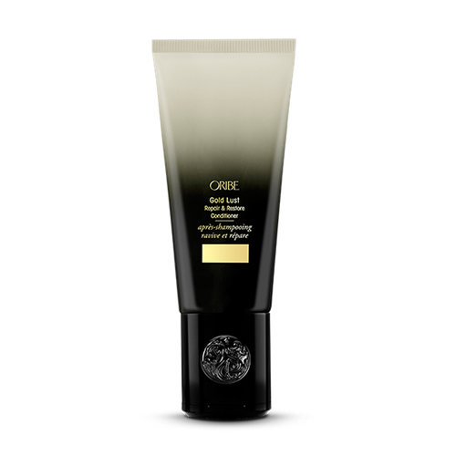 Oribe - GOLD LUST Conditioner gold to black ombre bottle with flip cap lid on bottom