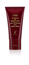Load image into Gallery viewer,  Oribe - Conditioner for Beautiful Color red bottle with flip top cap on bottom
