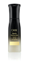 Load image into Gallery viewer, Oribe - Mystify Spray black to cream ombre with gold accents. Travel size