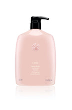 Load image into Gallery viewer, Oribe - Serene Scalp shampoo liter sized bottle. Baby pink color bottle with gold letting and black pump top.
