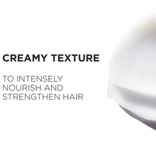 Load image into Gallery viewer, Kérastase Genesis Masque Reconstituant showcasing its rich cream texture designed to deeply nourish, detangle, and strengthen weakened hair fiber.
