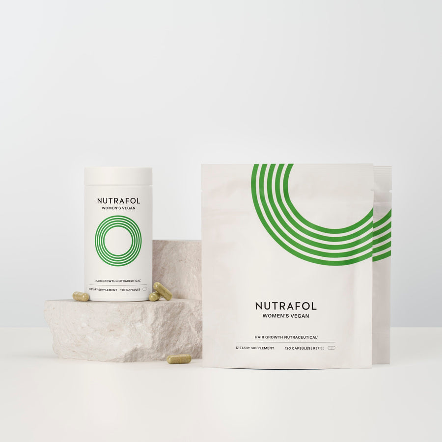 Nutrafol Women’s Vegan bottle with two refill pouches for a three-month supply