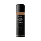 Oribe Airbrush Root Touch-Up Spray in Light Brown, 1.8 oz black aerosol bottle with a light brown shade band, shown upright from the front on white