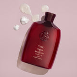 Oribe Shampoo for Beautiful Color bottle with foaming shampoo texture