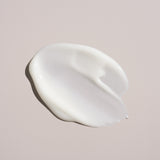 Creamy texture of Oribe Conditioner for Magnificent Volume