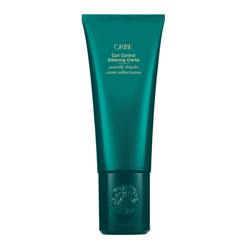 Oribe Curl Control Silkening Crème full size 5 oz tube in metallic emerald green packaging, shown upright from the front on white