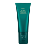 Oribe Curl Control Silkening Crème full size 5 oz tube in metallic emerald green packaging, shown upright from the front on white