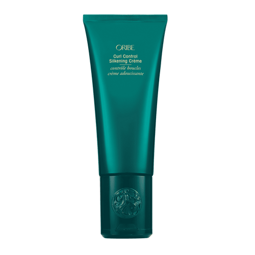 Oribe Curl Control Silkening Crème full size 5 oz tube in metallic emerald green packaging, shown upright from the front on white