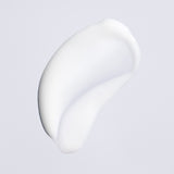 Lightweight cream texture of Oribe Featherbalm Weightless Styler