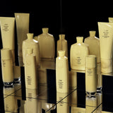 Oribe Hair Alchemy collection shampoo conditioner treatment and bond building elixir