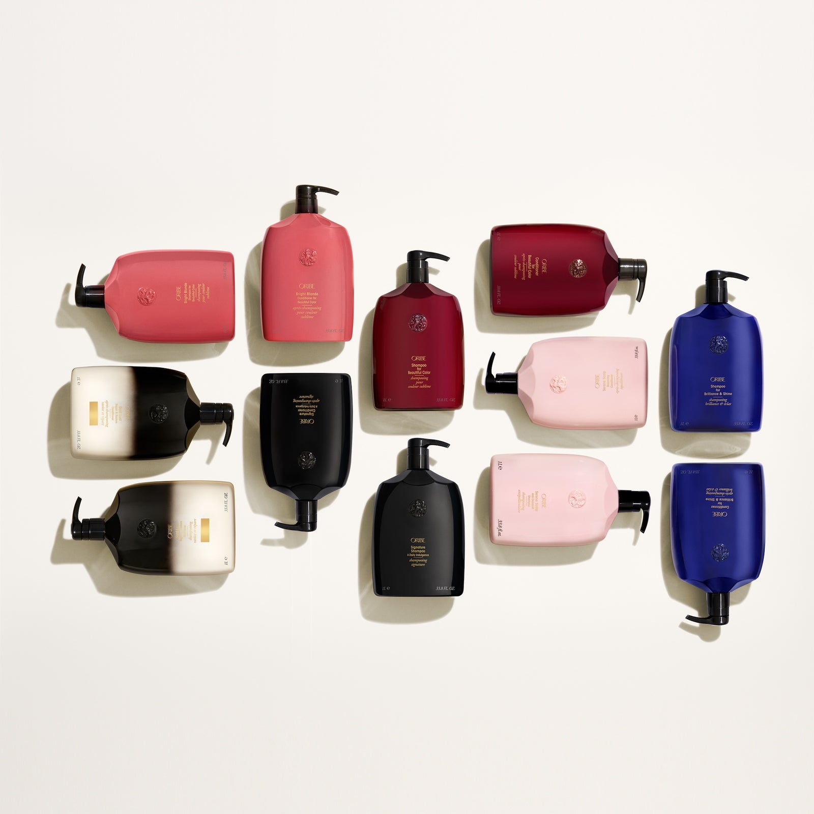Oribe liter shampoos and conditioners in colorful one liter bottles
