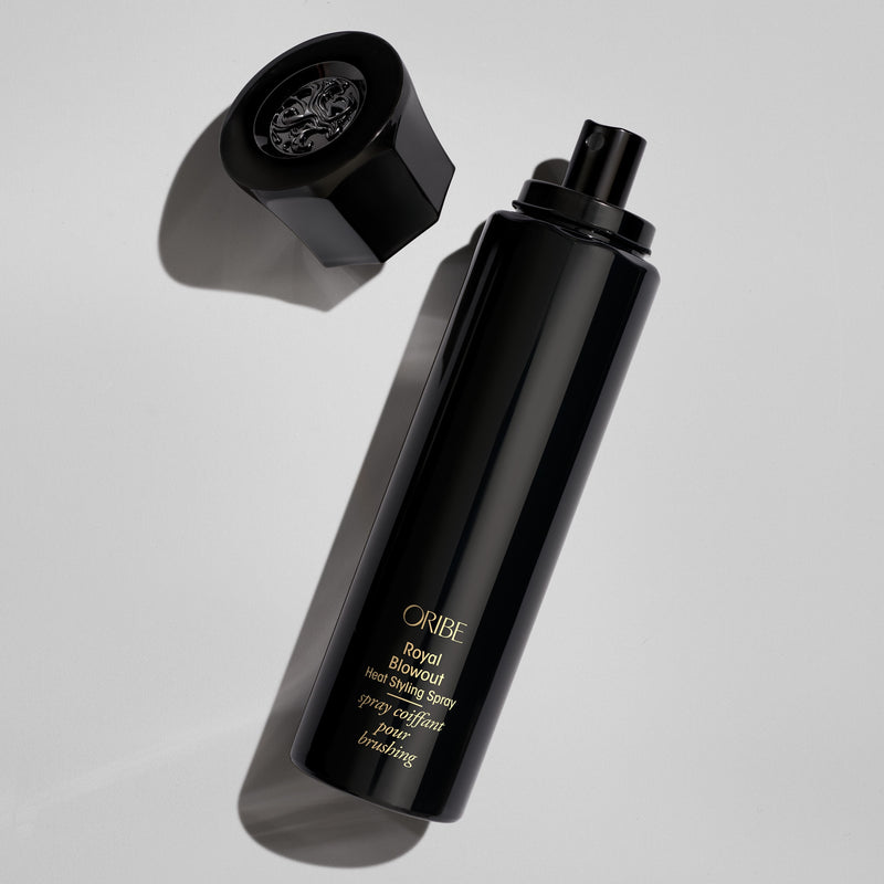 Oribe Royal Blowout Heat Styling Spray bottle with spray nozzle and cap removed