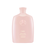 Oribe - Serene Scalp shampoo baby pink rounded bottle with gold lettering
