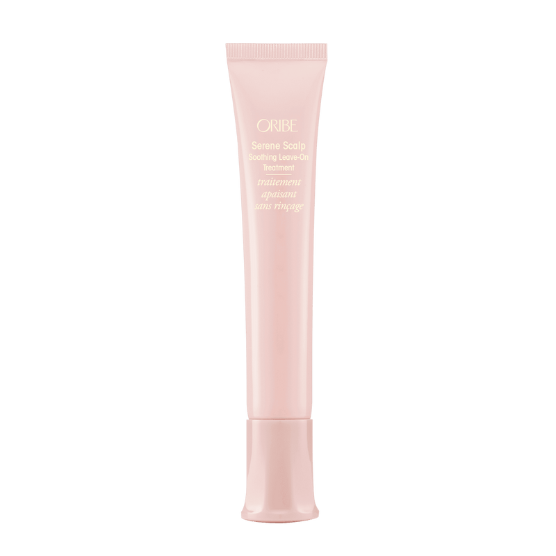 Oribe Serene Scalp Soothing Leave-On Treatment 1.7 oz in a pale pink tube, shown upright from the front on white