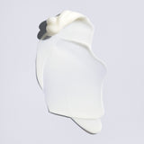 Lightweight white texture of Oribe Supershine Light Moisturizing Cream