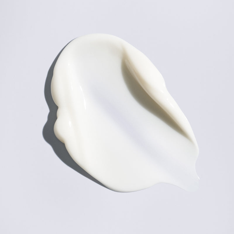 Silky white texture of Oribe Supershine Moisturizing Cream leave in conditioner