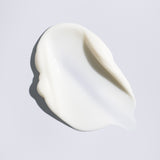 Silky white texture of Oribe Supershine Moisturizing Cream leave in conditioner