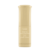 Oribe Swept Up Volume Powder Spray 0.21 oz in a pale gold pump bottle, shown upright from the front