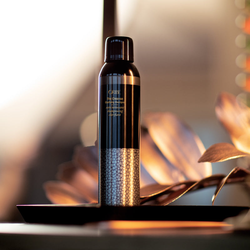 Oribe The Cleanse Clarifying Shampoo luxury deep cleansing shampoo for removing buildup while maintaining hair moisture.