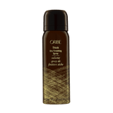 Oribe Thick Dry Finishing Spray travel 2.2 oz bronze aerosol can with intricate gold linework, shown capped and upright from the front