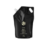 Oribe Signature Shampoo for all hair types — 33.8 oz liter refill.