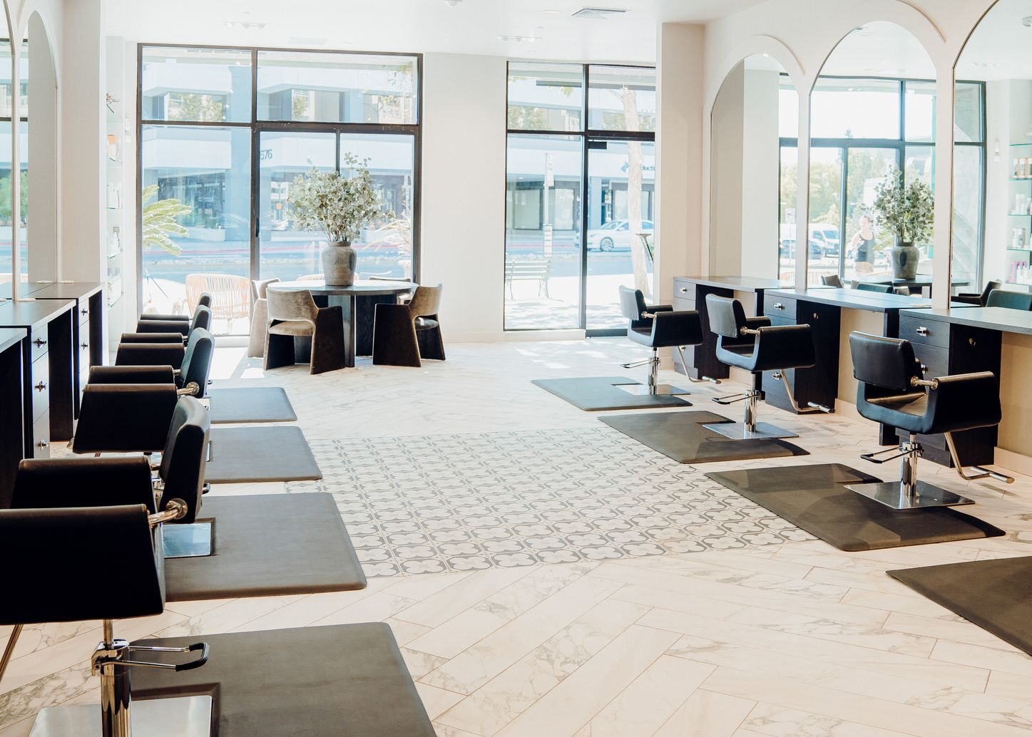 The/Studio salon interior with luxury waiting area.