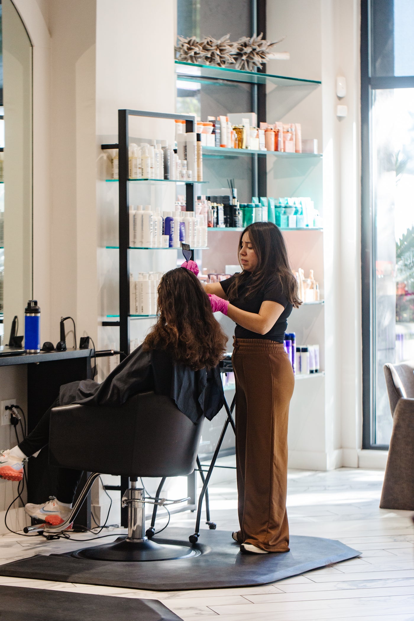 Cut and color artist working at The/Studio in Walnut Creek