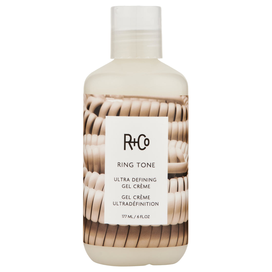 R+Co - RING TONE Creme product bottle with spiral phone cord background graphic