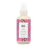 R+Co - Zipper bottle with pump top and clear lid. Pink and silver zipper background graphic