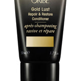 Oribe Gold Lust Repair & Restore Conditioner for damaged hair — 1.7 oz travel size.