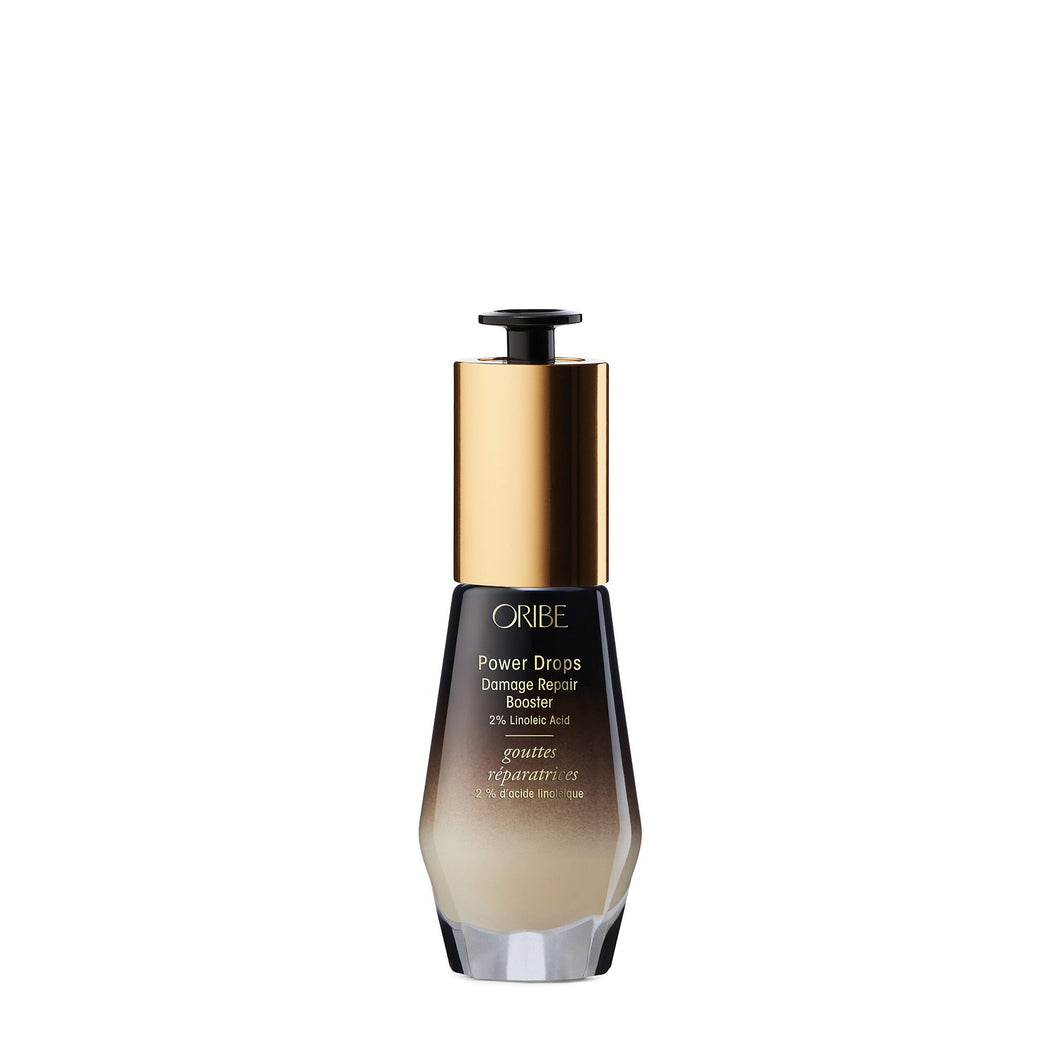Oribe - Power Drop Damage Repair gold lid with black to cream ombre bottle
