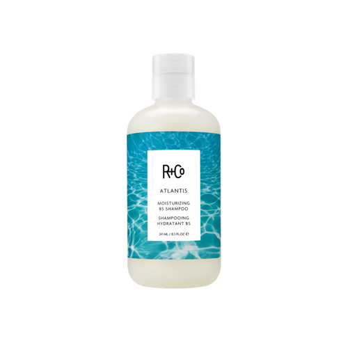 R+Co - Atlantis Shampoo 8.5 oz. bottle with water graphic background