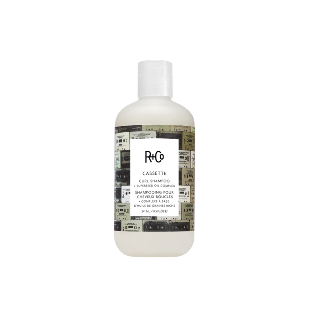 R+Co - CASSETTE Shampoo 8.5 oz. bottle with cassette graphic background