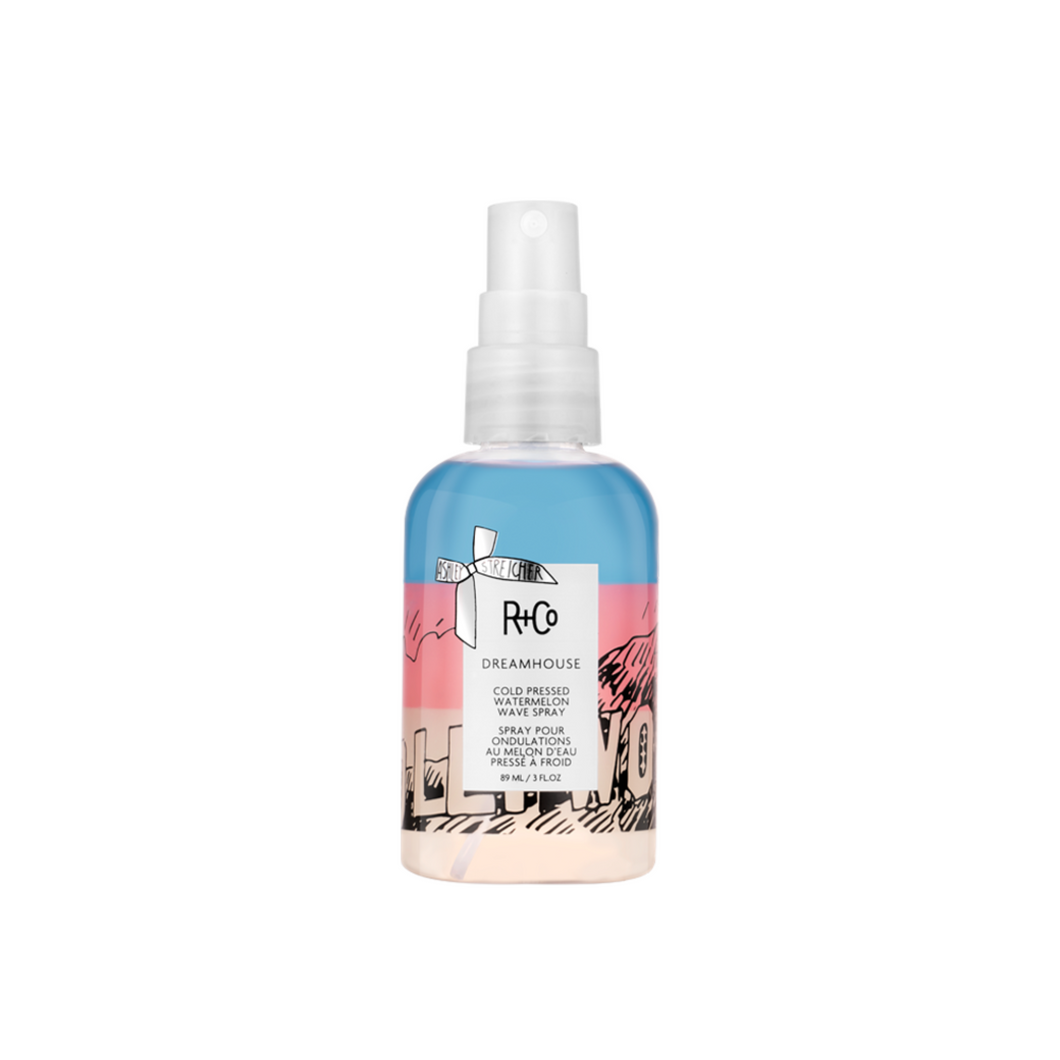 R+Co - DREAMHOUSE non-aerosol spray bottle with blue and pink Hollywood sign graphics