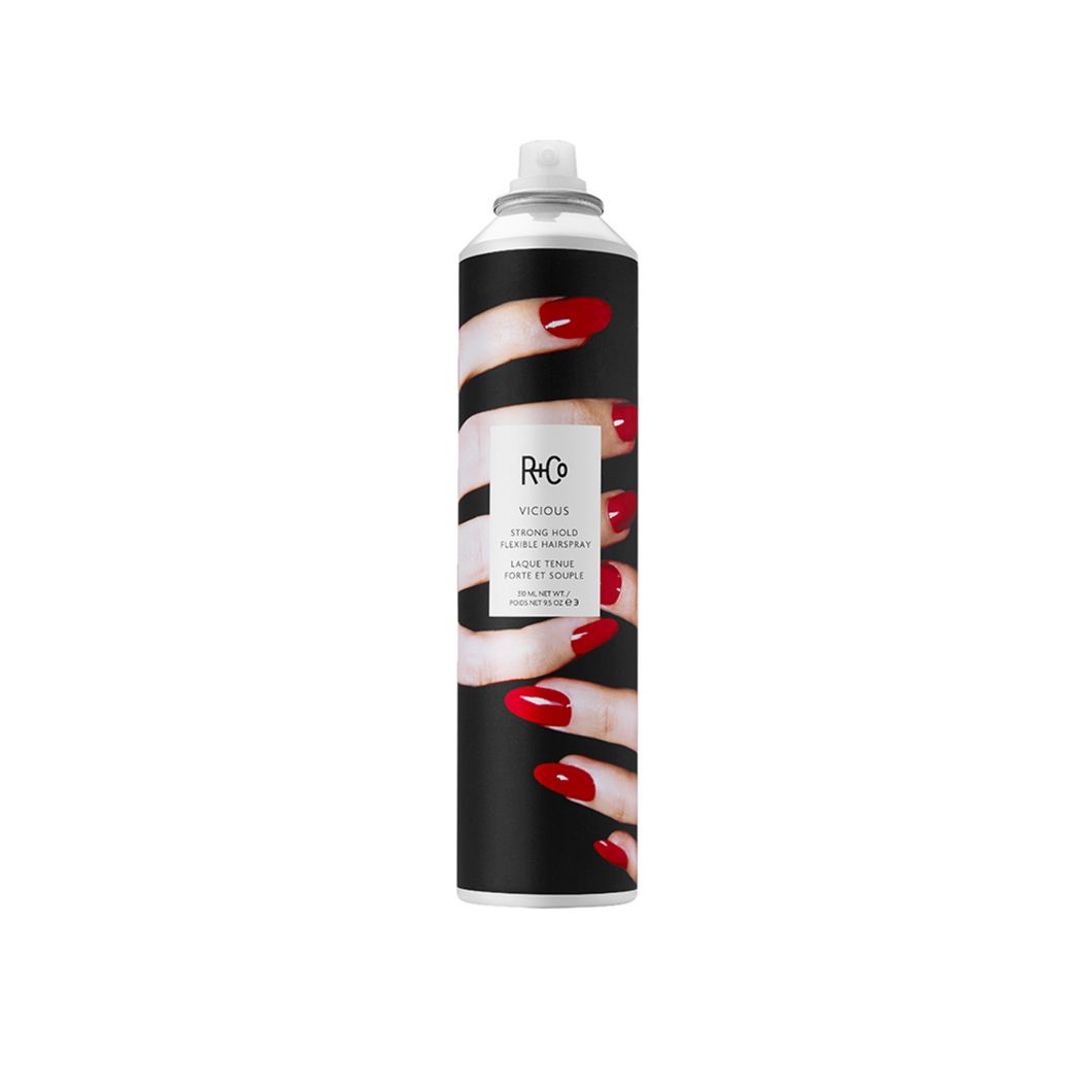 R+Co - VICIOUS Hairspray with photo of hand with red nails around can