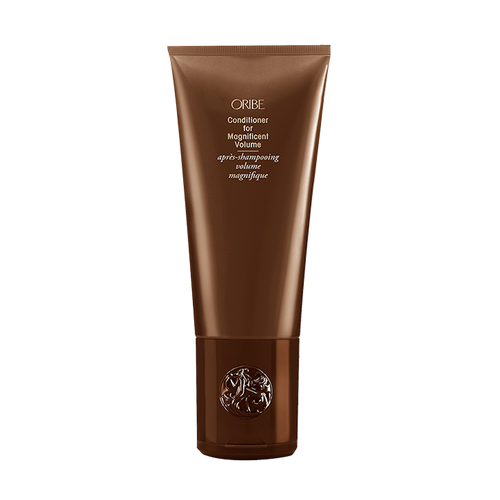 Oribe - Conditioner for Magnificent Volume Brown bottle with flip top cap on bottom