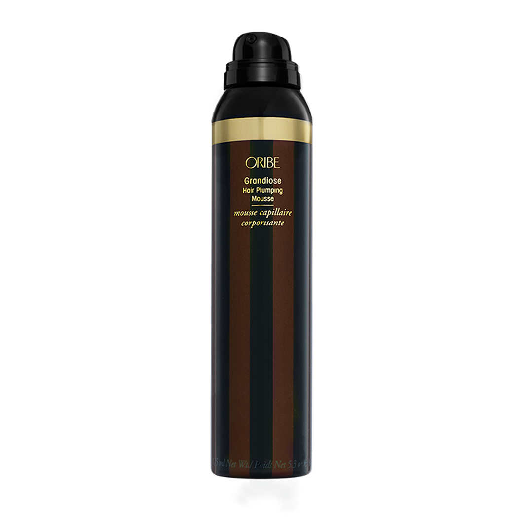 Oribe - Grandisoe mousse bottle with black and brown stripes and a black top