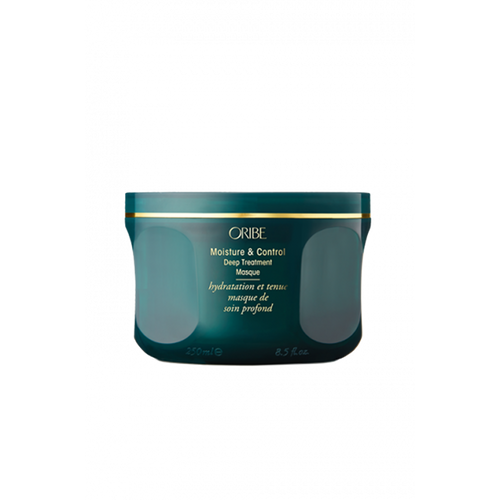 Oribe - Moisture & Control Masque in green circular jar with twist open top lid.