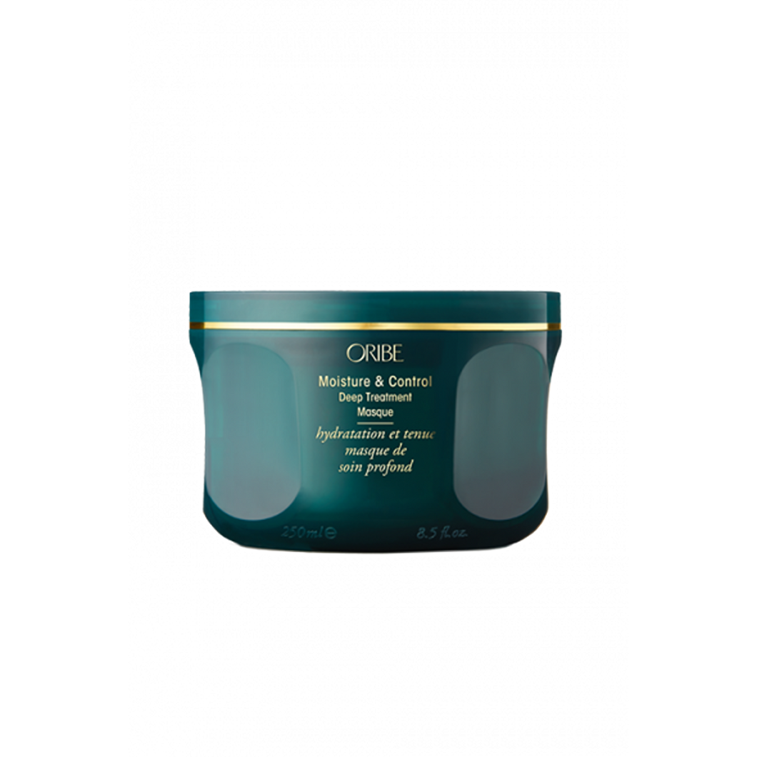 Oribe - Moisture & Control Masque in green circular jar with twist open top lid.