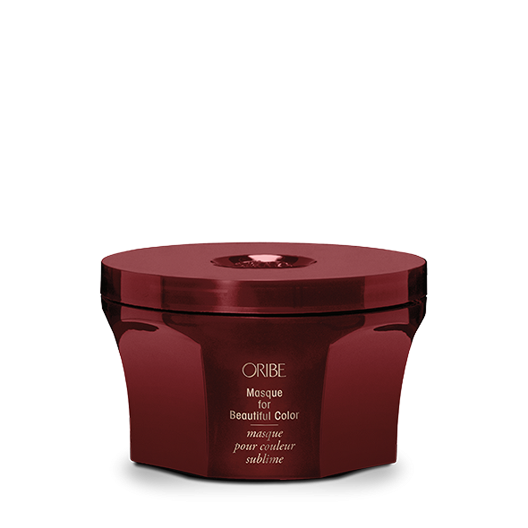 Oribe - Masque for Beautiful Color red circular jar with twist top lid