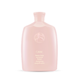Oribe - Serene Scalp shampoo baby pink rounded bottle with gold lettering