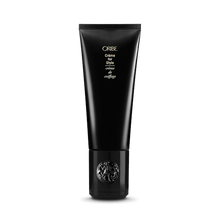 Load image into Gallery viewer, Oribe - Creme for Style black bottle with flip top cap on bottom
