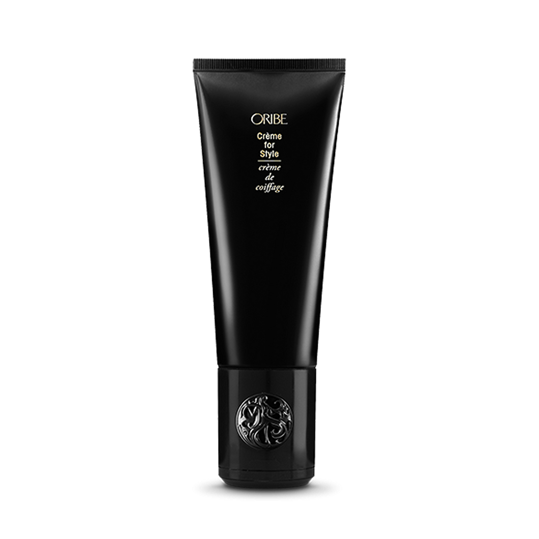 Oribe - Creme for Style black bottle with flip top cap on bottom