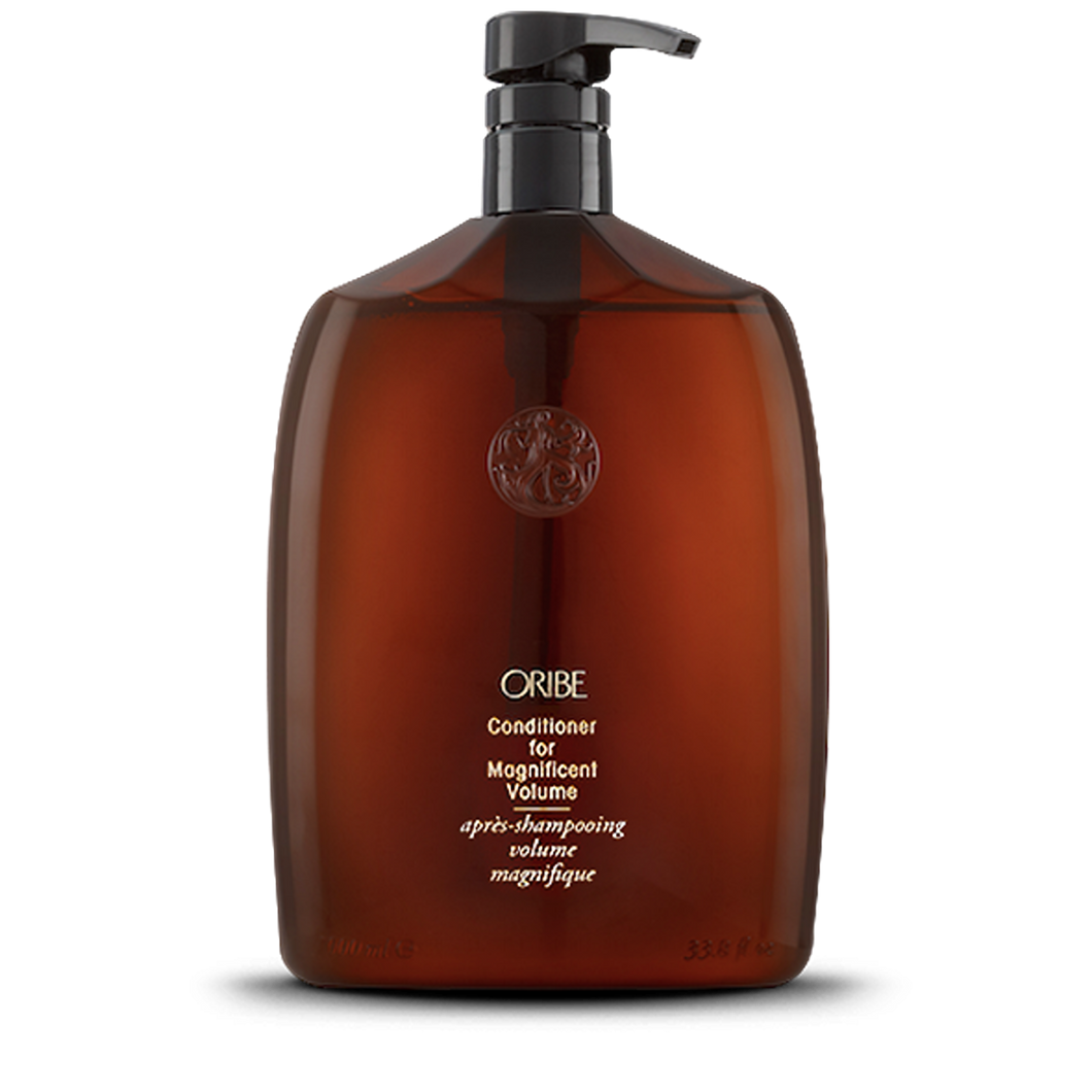 ORIBE - Conditioner for Magnificent Volume brown liter sized bottle with gold lettering and black pump top