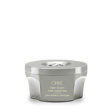 Oribe Fiber Groom Elastic Texture Paste for flexible hold.