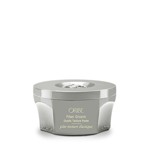 Oribe Fiber Groom Elastic Texture Paste for flexible hold.